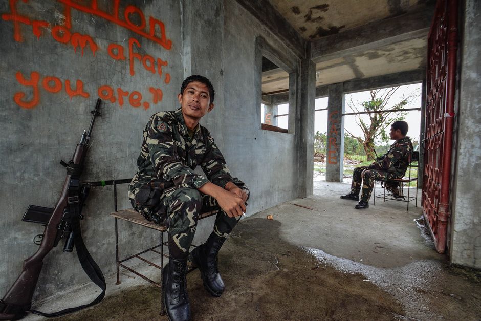 A soldier sitting at a desk taking the Defense Language Aptitude Battery (DLAB) test